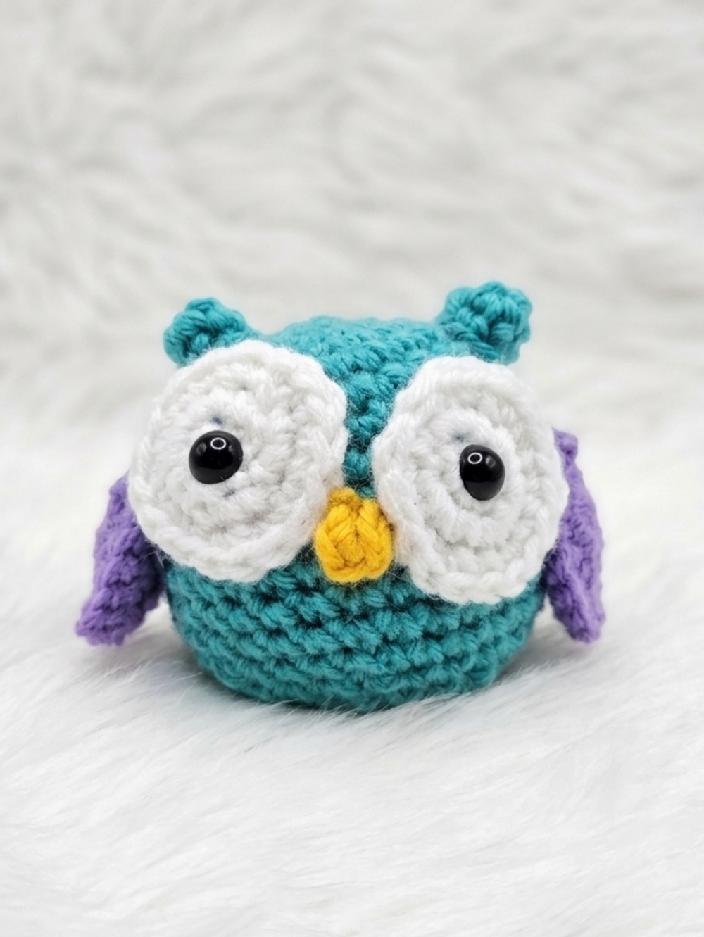 Handmade Teal Crochet Owl Plush with Purple Wings and Yellow Beak